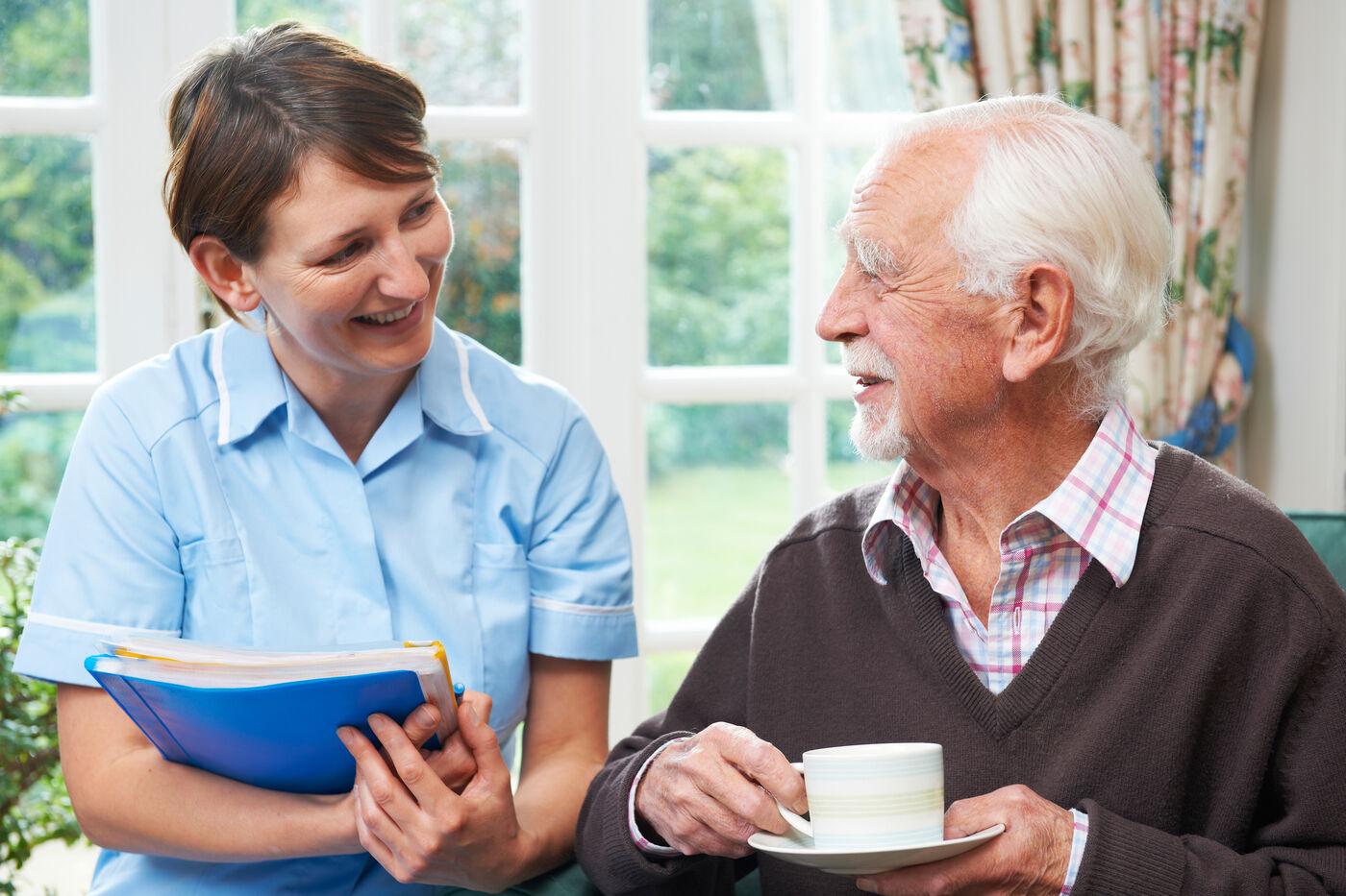 Olive carer with client